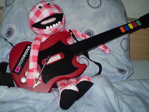 rocking out on the guitar hero